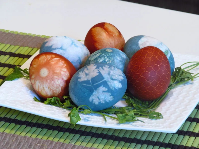 Naturally dyed Easter eggs with leaf patterns, one of the Easter food traditions in Central Europe