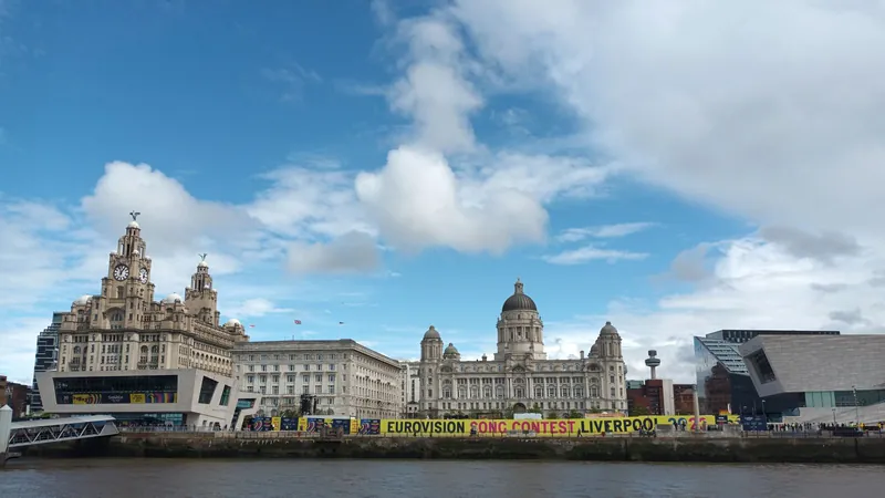 Liverpool Pier Head with the Eurovision 2023 banner, one of the big family festivals in May