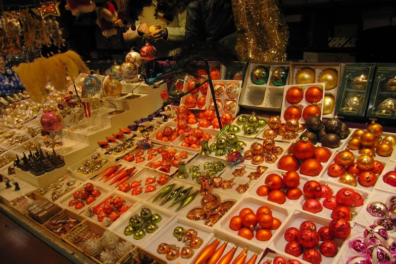Stall of colourful glass baubles in Strasbourg, a highlight of Christmas markets with kids