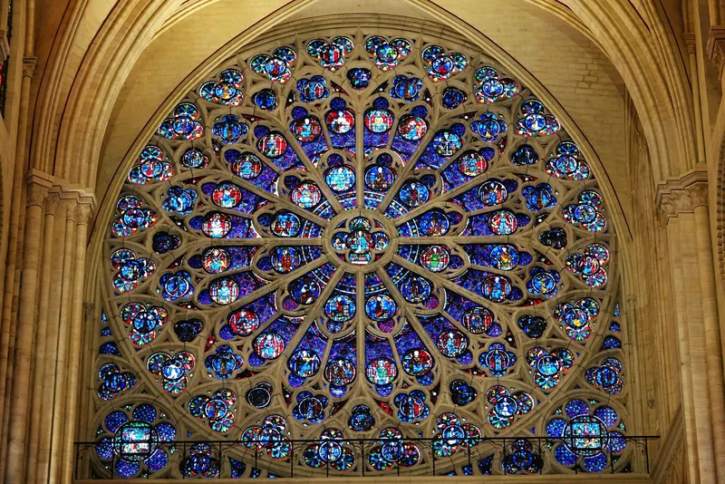 The restored south rose window inside Notre-Dame, a highlight of Paris with kids at Christmas
