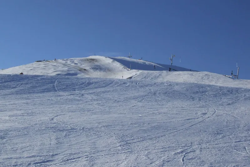 Wide groomed slope at Park Snow Donovaly in Slovakia, a great choice for budget family skiing