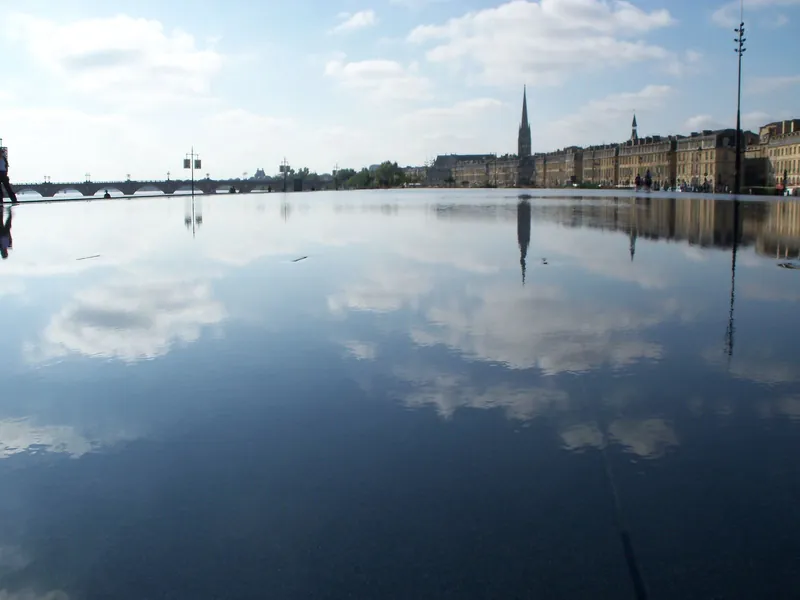 The Miroir d'eau in Bordeaux reflecting the old town, one of the most famous water playgrounds in Europe