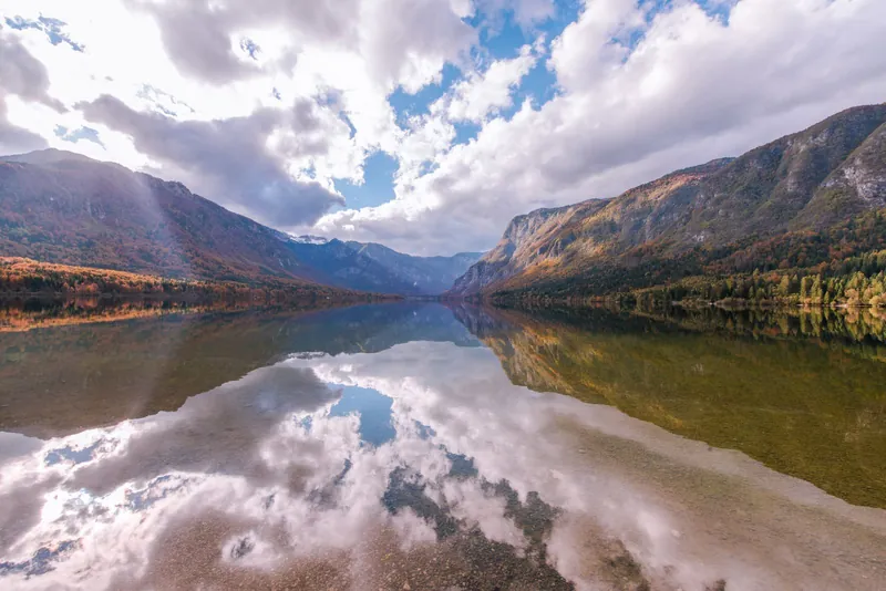 Lake Bohinj in Triglav National Park in autumn colours, a classic for national parks with kids