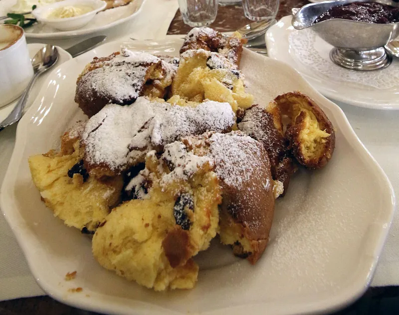Kaiserschmarrn pancake with plum sauce at Café Central in Vienna, comfort food at family-friendly restaurants